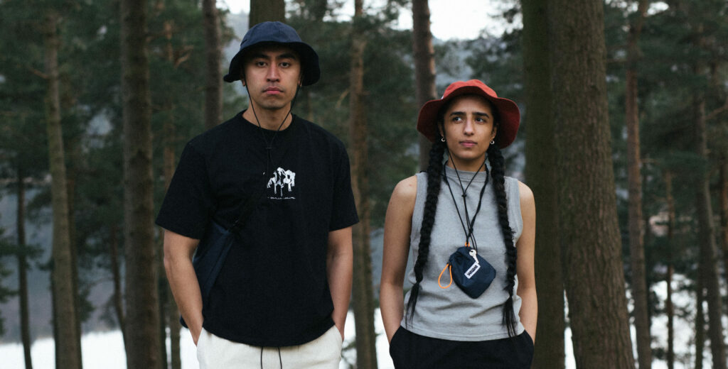 wawwa man and woman modelling in woods