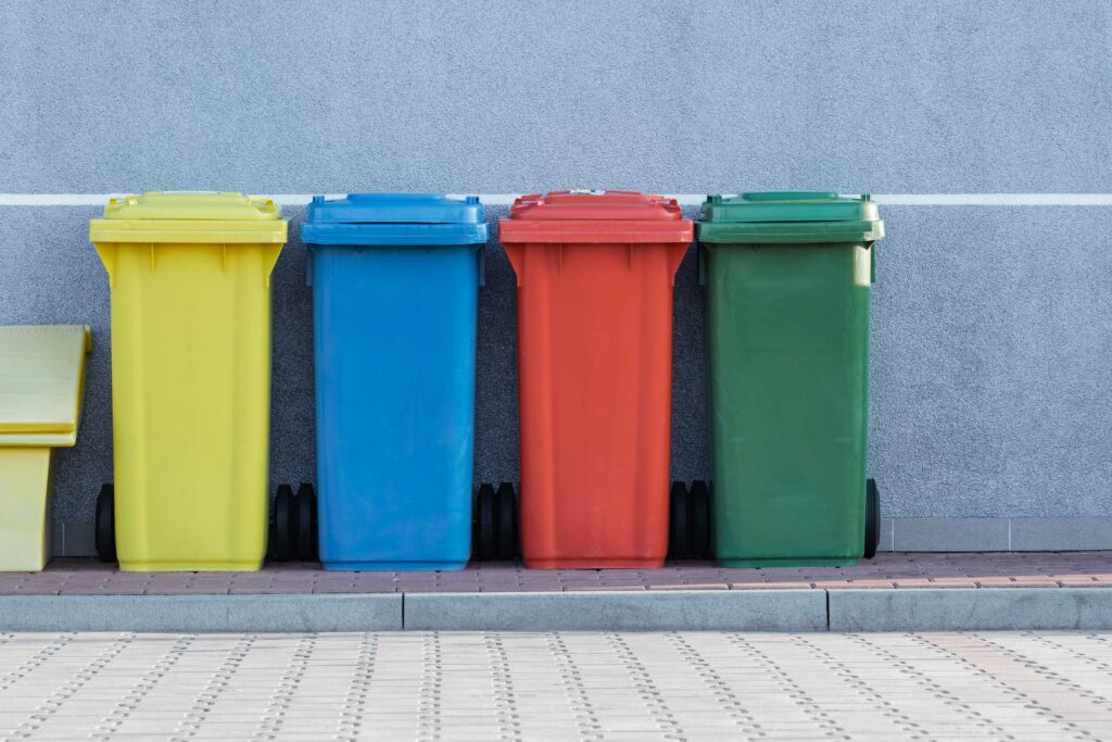 Four bins in yellow, blue, red and green