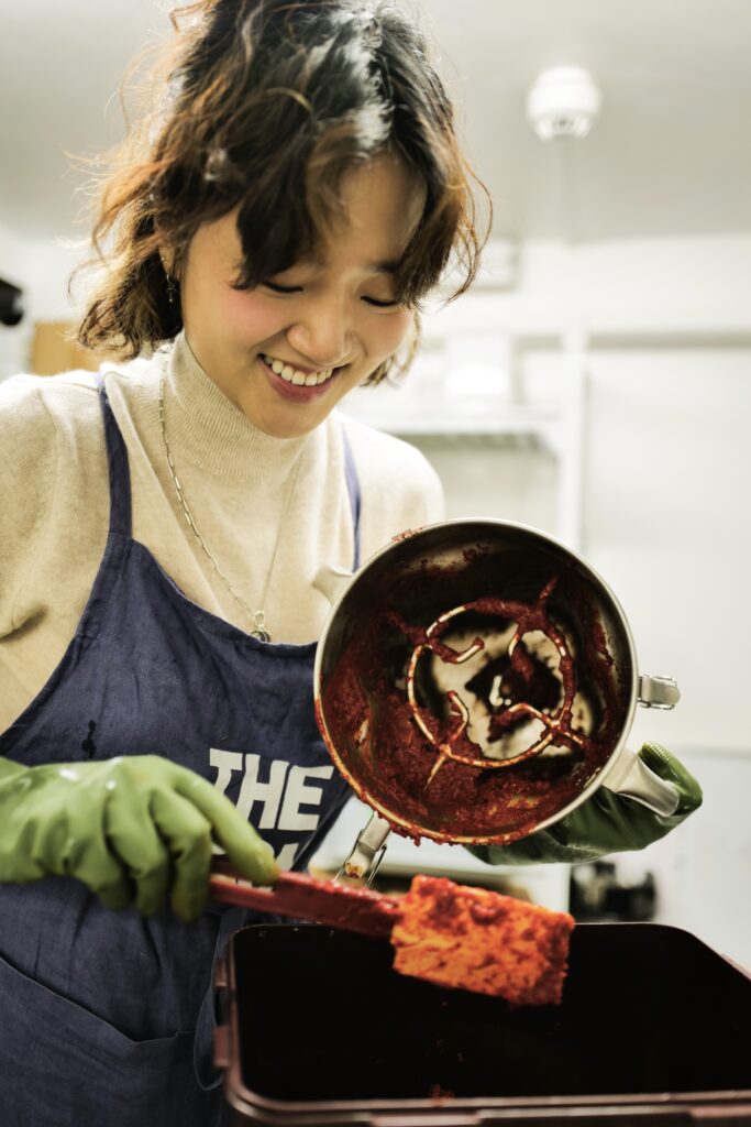 Rebecca Ghim making Kimchi